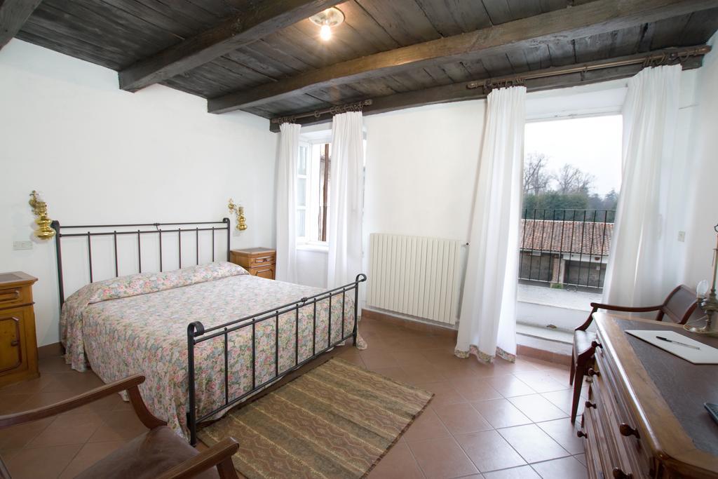 Agriturismo Il Torrione بينيرولو الغرفة الصورة